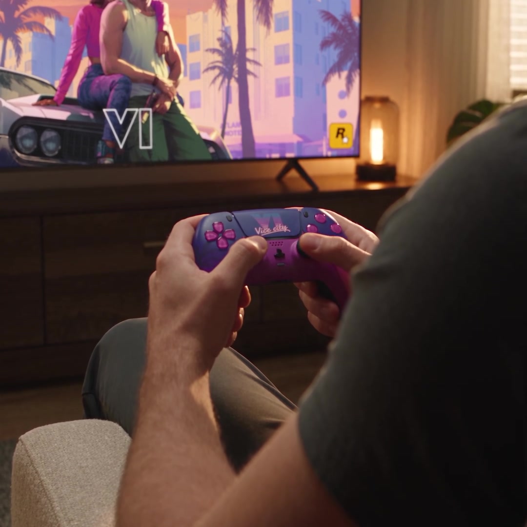 Illustrative trailer lifestyle still: sunset shell design shown installed during couch gaming; controller not included