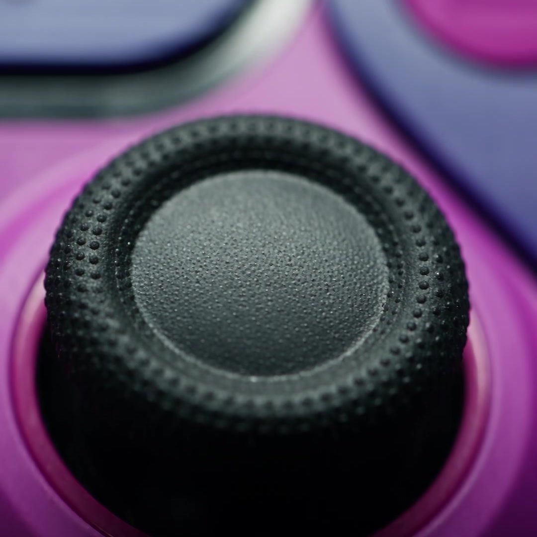 Illustrative trailer close-up of thumbstick and surrounding shell design; controller not included